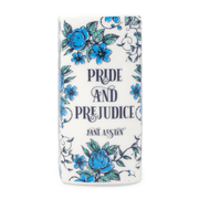 Spine view of Pride and Prejudice book shaped candle with title text and blue floral pattern.
