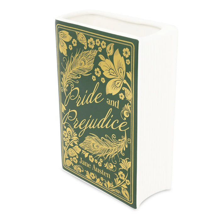 Angled view showing white sculpted pages and top opening of the ceramic book vase.