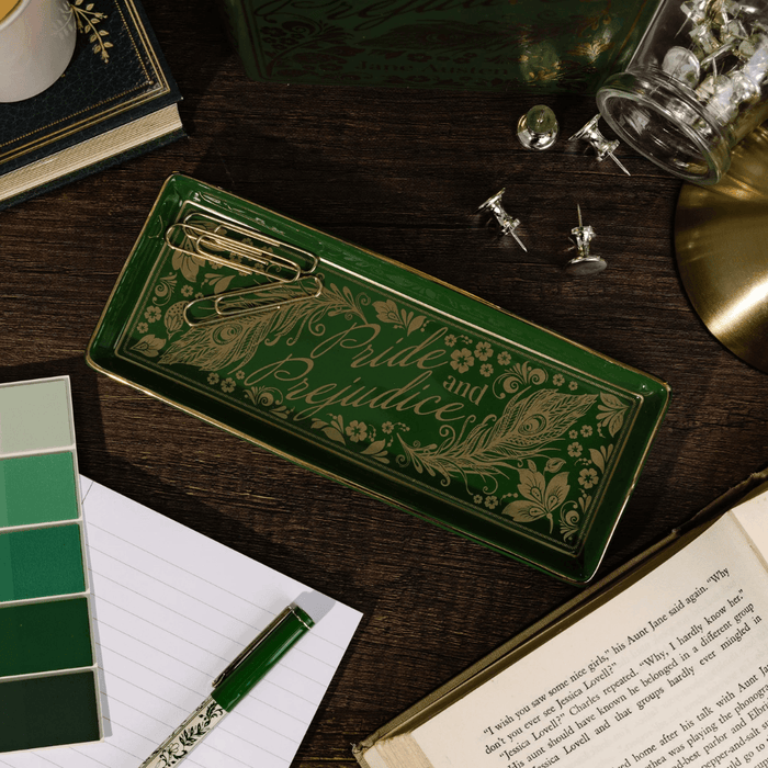 Pride and Prejudice literary trinket tray on a desk with stationery and book
