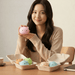 Person holding a pink animal dumpling squishy from the blind box collection