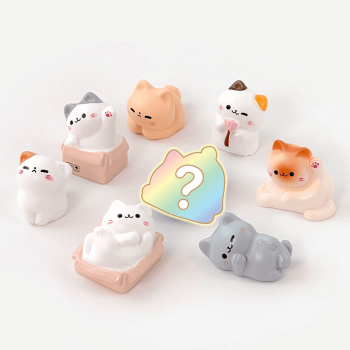 Random Cozy Cat miniature figures arranged in a circle with hidden figure mystery icon