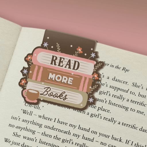 Read More Books magnetic bookmark marking a page in a book