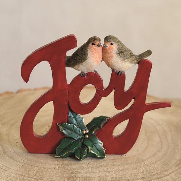 Freestanding JOY ornament decorated with robins and gold berries

