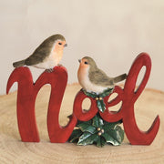 Freestanding Noel sign decorated with robins and gold berries


