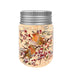 14cm jar-shaped LED water spinner with robins and red berries, silver lid, warm glow on white background.
