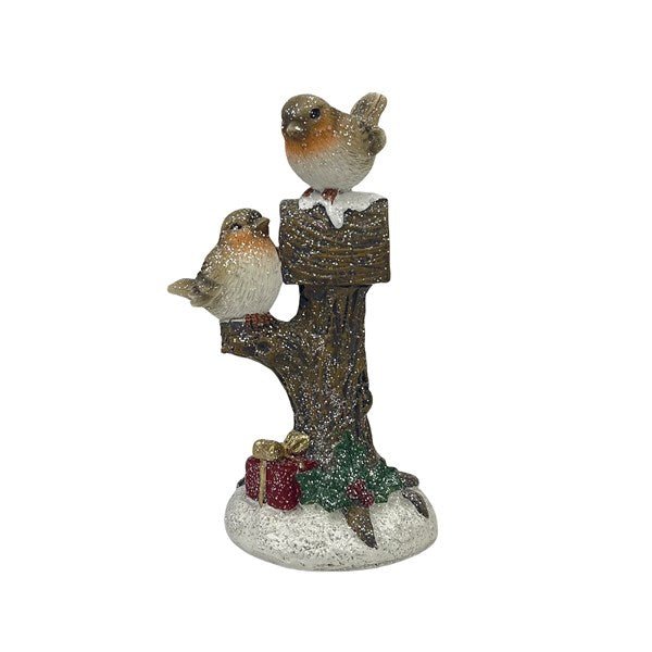 Two robins perched on a snowy tree with birdhouse and gifts, glitter-finished figurine, 9.5 x 17cm, white background.