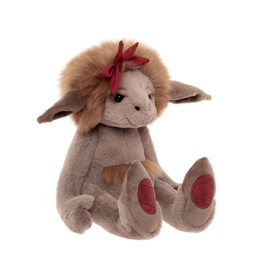 Ruby Roo Bearhouse by Charlie Bears crystal troll plush toy, side angled view with fluffy tan mane, red flower detail and red crystal foot pads