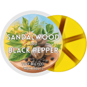 Sandalwood & Black Pepper wax melt pot with six yellow segments and spice-and-woods label