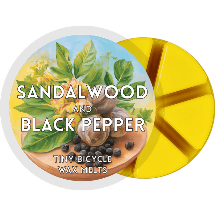 Sandalwood & Black Pepper wax melt pot with six yellow segments and spice-and-woods label