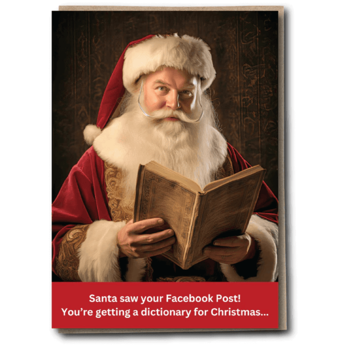 Funny Christmas card with Santa reading and joke about Facebook posts earning a dictionary.