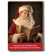 Funny Christmas card with Santa reading and joke about Facebook posts earning a dictionary.