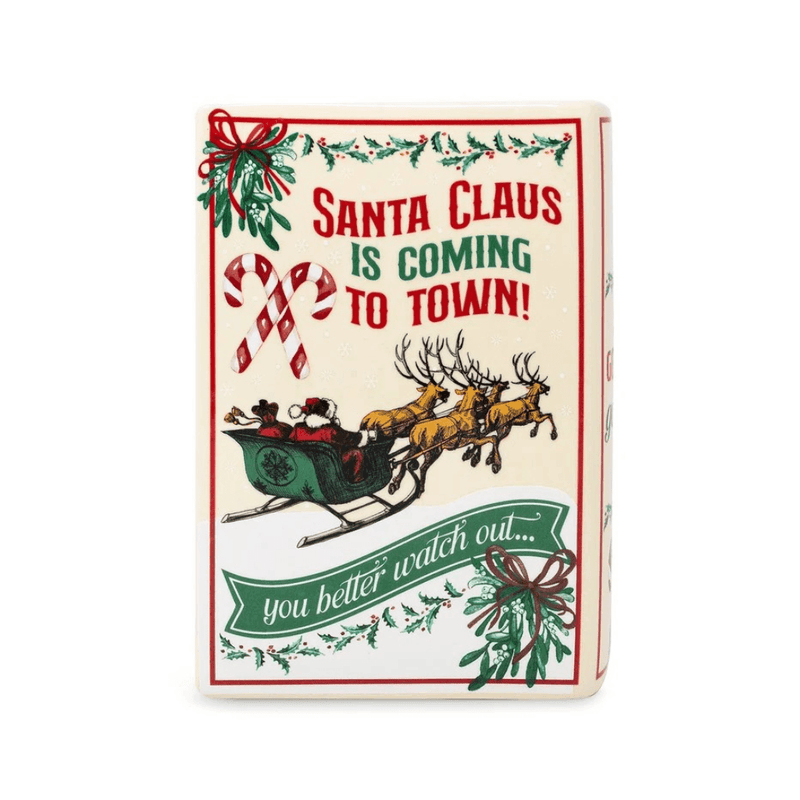 Back of Santa ceramic book vase with Santa Claus Is Coming to Town lettering, flying reindeer and green sleigh