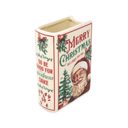 Angled front view of large Santa Christmas ceramic book vase showing Father Christmas artwork, festive lettering and wide top opening