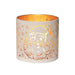 Round white and gold Santa silhouette tealight candle holder shown glowing