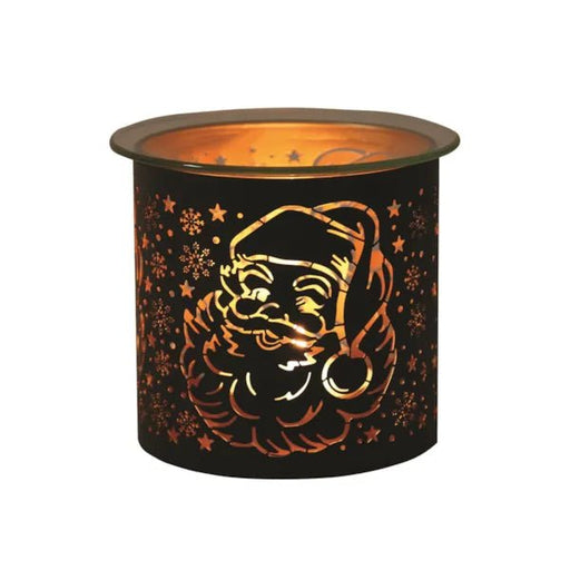 Black and gold Santa silhouette tealight wax melter glowing with warm light