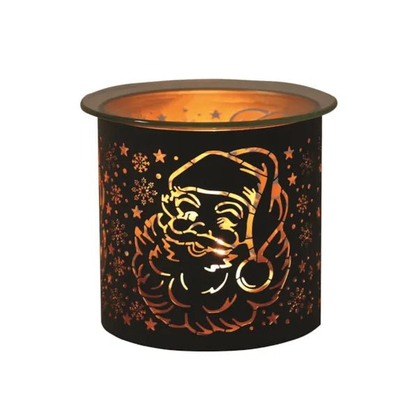 Black and gold Santa silhouette tealight wax melter glowing with warm light