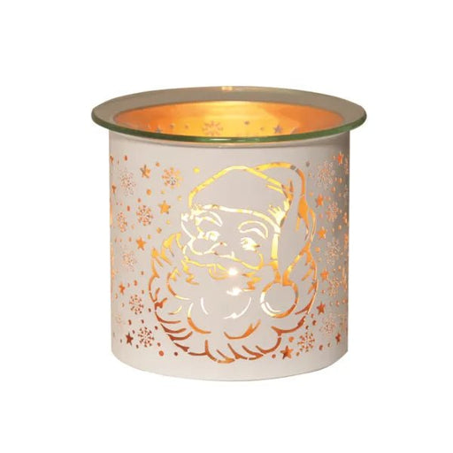 White and gold Santa silhouette tealight wax melter glowing with warm light