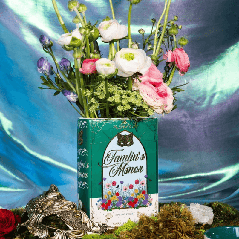 Spring Court book vase filled with flowers in a fantasy-inspired display