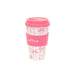 Pink Sass & Belle bow travel coffee cup with lid and grip sleeve on a white background