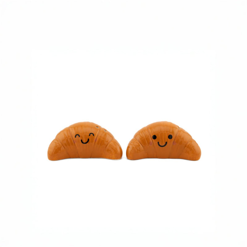 Sass & Belle Croissant salt and pepper shakers, front view with smiling faces