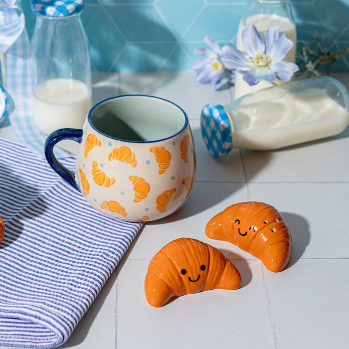 Sass & Belle Croissant salt and pepper shakers in a cute tabletop lifestyle setting