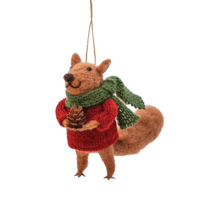 Sass & Belle felt squirrel Christmas tree decoration wearing a red jumper and green scarf, holding a pine cone, hanging by a loop