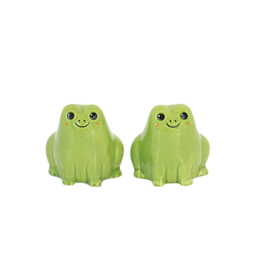 Two green frog salt and pepper shakers by Sass & Belle on a white background