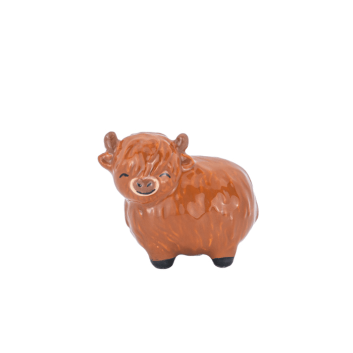 Sass & Belle Highland Cow pocket token dolomite figure in orange-brown on a white background