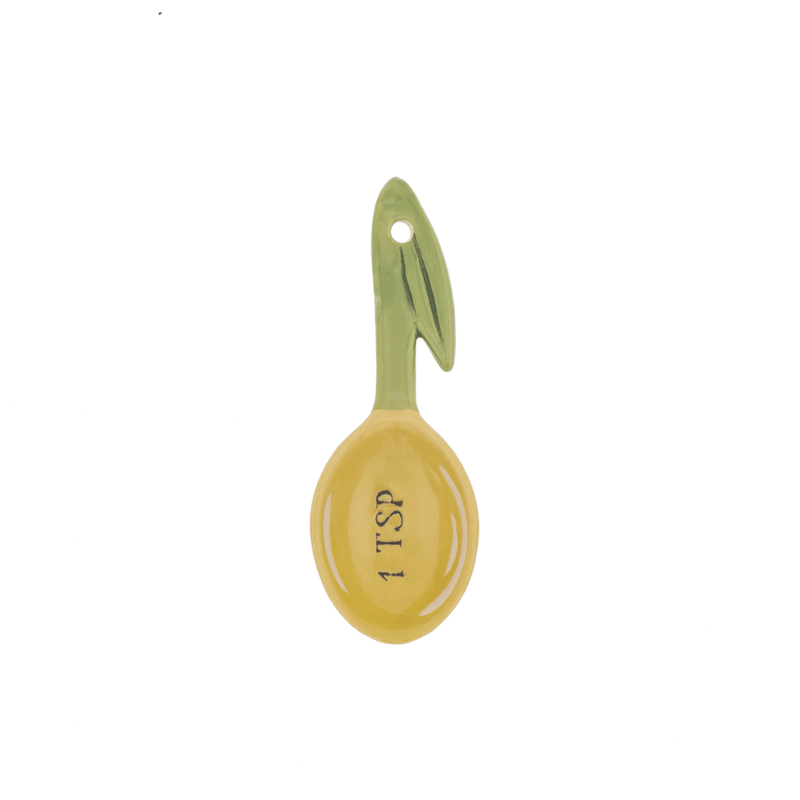 Sass and Belle olive measuring spoon showing the 1 teaspoon measurement with yellow spoon bowl and green handle