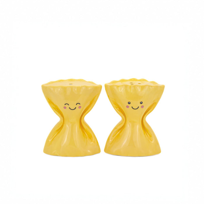 Yellow farfalle pasta salt and pepper shakers by Sass & Belle on a white background