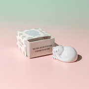 Pawfect Cat pocket token beside its Sass & Belle gift box on a pastel pink background