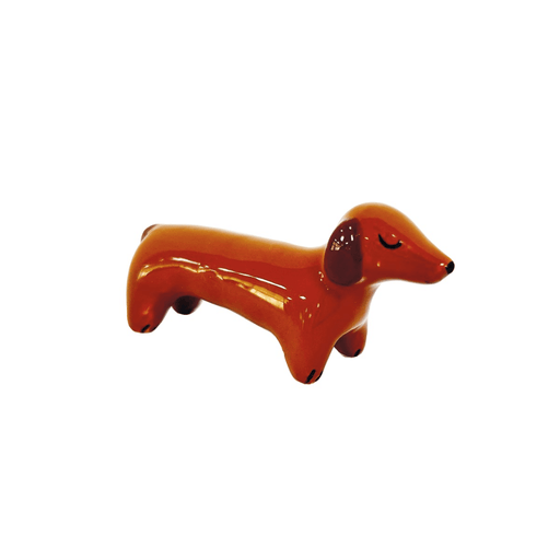 Sass & Belle Sausage Dog pocket token dolomite figure in brown with closed eyes on a white background