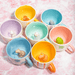 Sass and Belle surprise animal mugs collection featuring colourful mugs with hidden animal figures inside