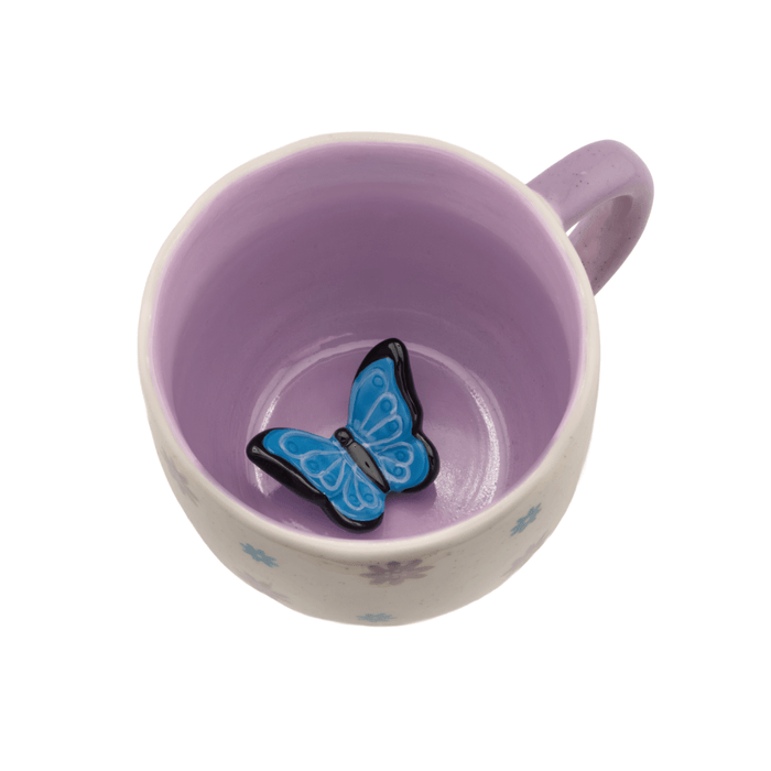 Sass and Belle Surprise Butterfly mug showing the hidden blue butterfly figure inside the purple interior