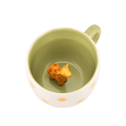 Sass and Belle Surprise Giraffe mug showing the hidden giraffe figure inside the green interior