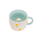 Top view of the Sass and Belle Surprise Sheep mug showing the hidden sheep figure inside and yellow flower pattern