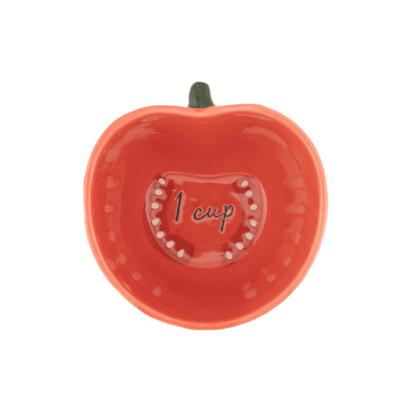 Sass and Belle tomato measuring cup showing the 1 cup measurement inside the orange stoneware tomato design
