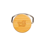 Top-down view of Sass & Belle engraved bamboo screw lid with silver carry handle for mushroom metal water bottle
