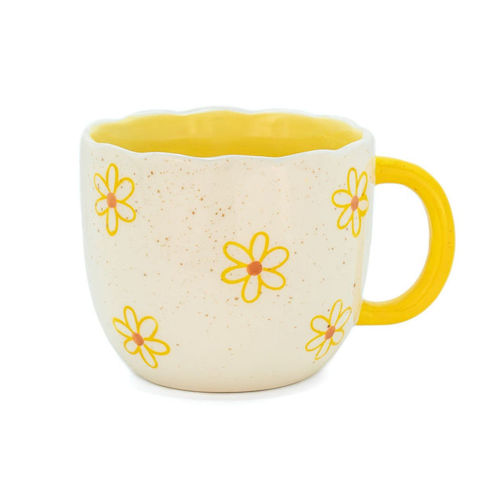 Side profile of Sass & Belle Highland Cow Daisy Mug featuring cream exterior with daisy prints and yellow handle

