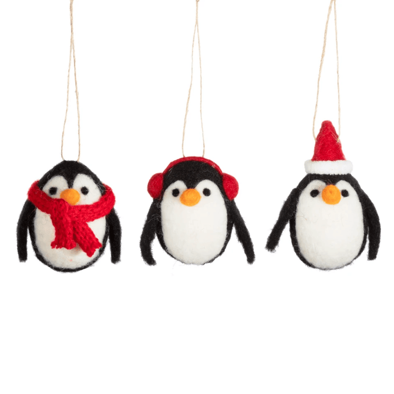 Decorate your tree with a set of three Sass & Belle felt penguins, featuring festive scarf, earmuff and Santa-hat designs.