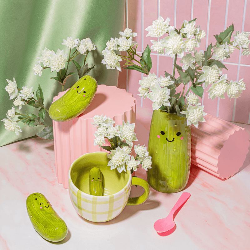 Sass & Belle pickle salt and pepper shakers displayed with matching kitchenware