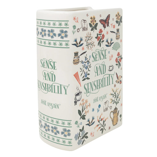 Angled front view of Sense and Sensibility ceramic book vase in cream with botanical illustrations and green lettering.