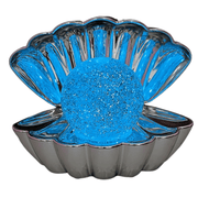 Silver metallic colour changing LED clam lamp with glowing blue glitter pearl night light.