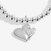 Close-up of the Joma Jewellery double heart charm on a silver-plated beaded Bracelet, with a tiny star detail.