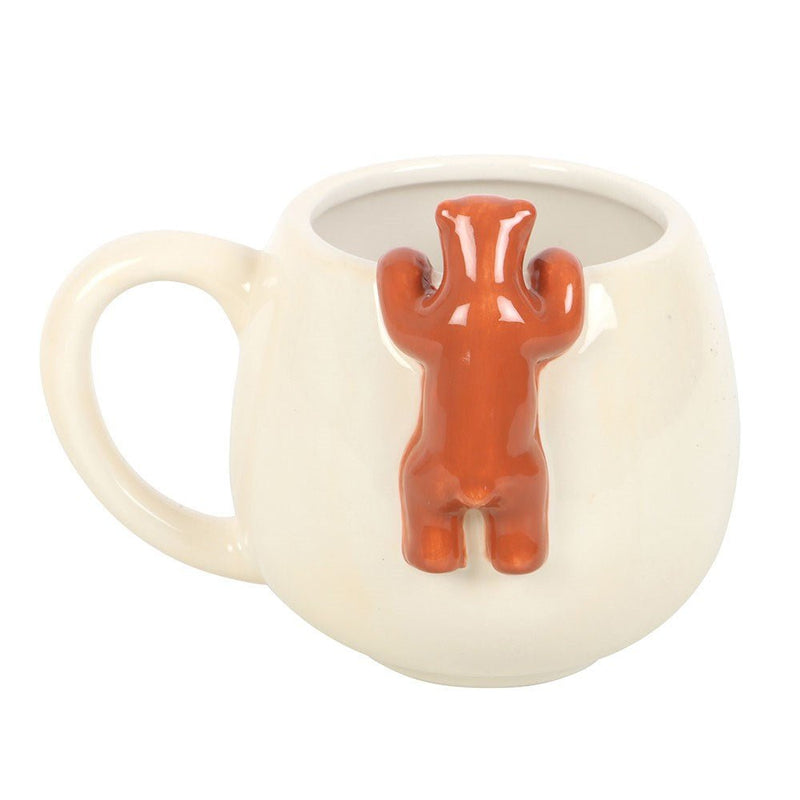 Rear view of ceramic Sleepy Bear mug with full bear figure clinging to back.

