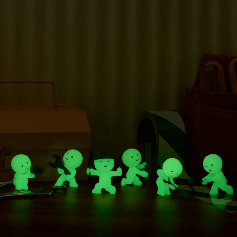 Smiski Construction Series figures glowing in the dark