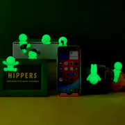 Smiski Hippers decorative figures glowing in the dark on everyday items