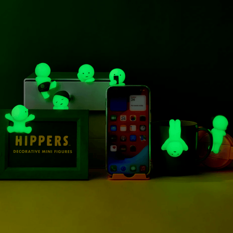 Smiski Hippers decorative figures glowing in the dark on everyday items