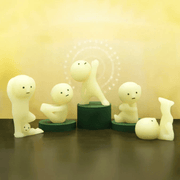 Smiski Yoga Series figures displayed in relaxing yoga poses