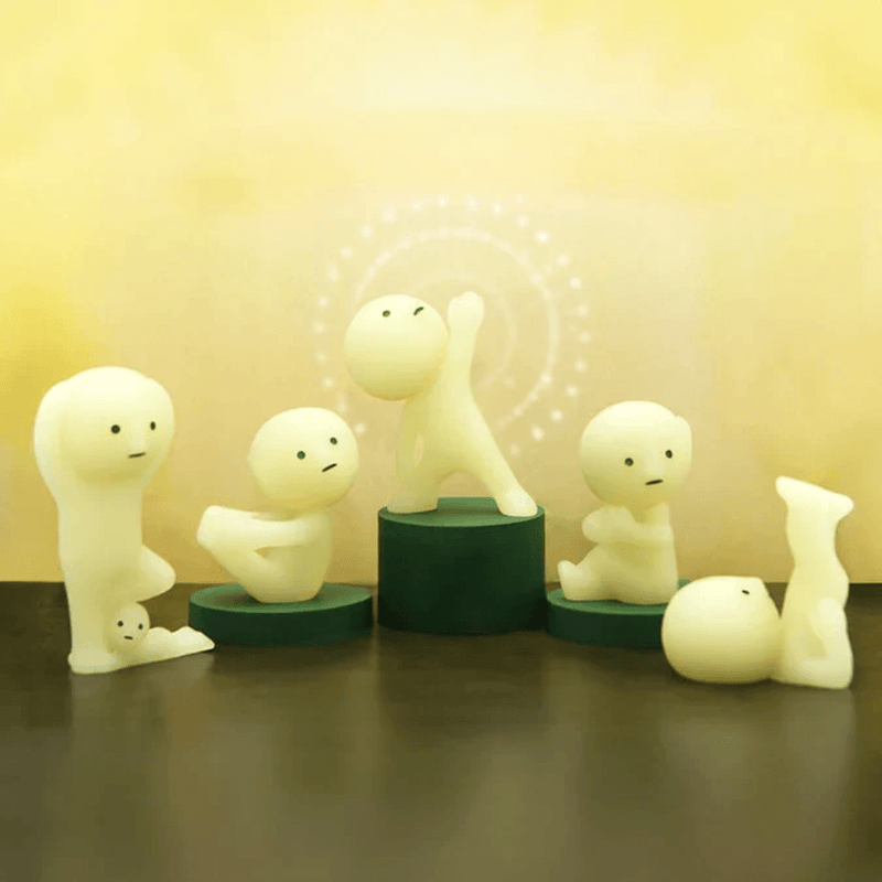 Smiski Yoga Series figures displayed in relaxing yoga poses